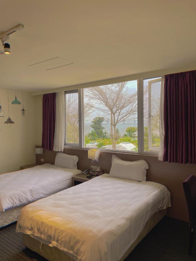 Breeze And Waves Hostel Jinning Esterno foto