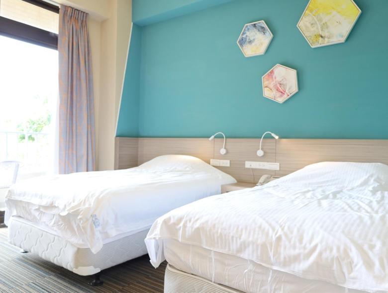 Breeze And Waves Hostel Jinning Esterno foto